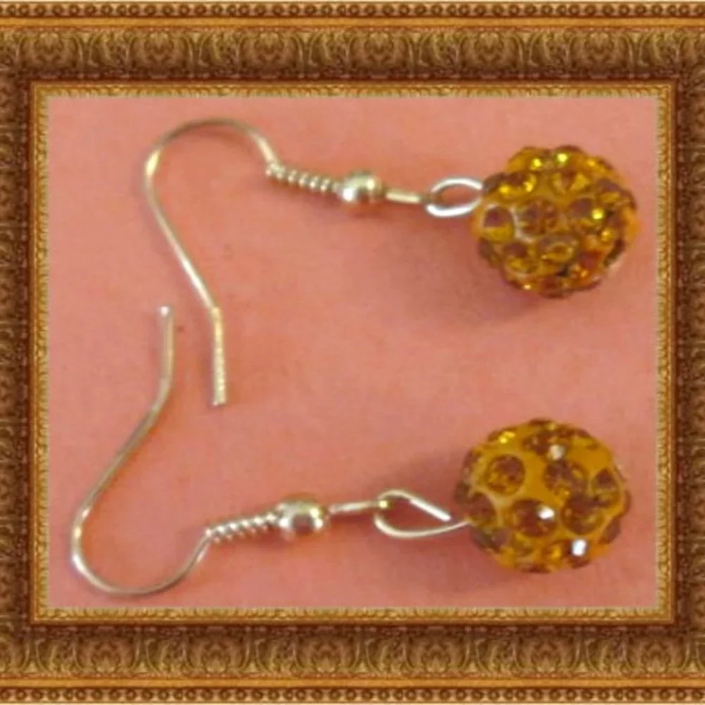 Gold Tone Dangle Earrings With Orange Ball Designs & Orange Crystals
